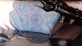 total black outfit with fishnets pantyhose and over the knee boots