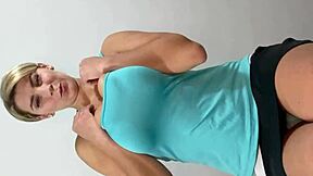 European milf bounces big tits, plays with panties, fucks pussy with huge glass dildo.