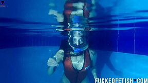 Helen Star Dives Underwater In Pool With Mask