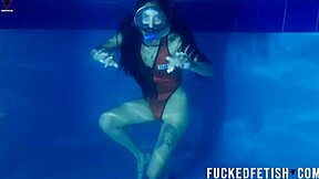 Helen Star Dives Underwater In Pool With Mask