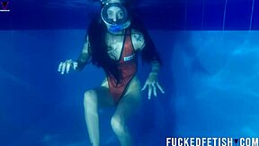 Helen Star Dives Underwater In Pool With Mask
