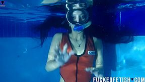 Helen Star Dives Underwater In Pool With Mask