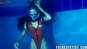 Helen Star Dives Underwater In Pool With Mask