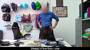 Teen shoplifter cooperates with police demands in the shop.