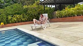 naughty redhead savors and mounts a huge cock by the pool with andy rose