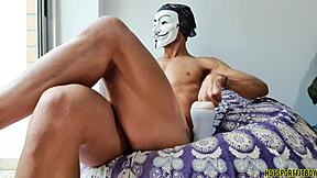 A mysterious guy fucks a fleshlight at the window while fingering ass on Halloween