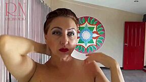 Naked nudist hairdresser cuts her own hair