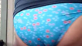 Wife's panties worn with teasing delight in intimate moments