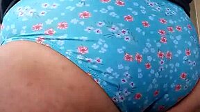 Wife's panties worn with teasing delight in intimate moments