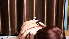 April Maxima sucks a dildo before giving it a footjob