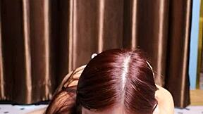 April Maxima sucks a dildo before giving it a footjob