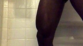 I enjoy stroking in the shower with my big black cock.
