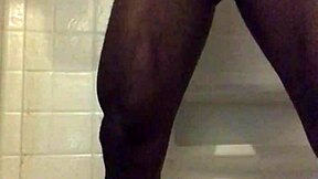 I enjoy stroking in the shower with my big black cock.