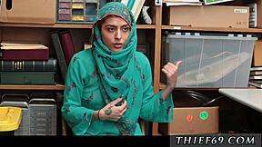 Police woman catches amateur hijab-wearing arab teen for stealing