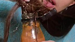 Brunette With Pigtails Plays With Junk Food In Mouth And Hair