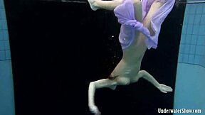 Aneta Shows Big Tits In Purple Dress By The Pool