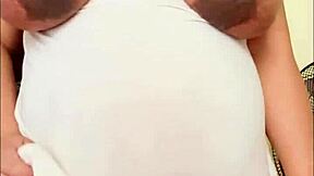 pregnant arab girl with a big belly and milky boobs