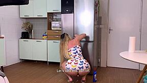 Little bitch cleaning the refrigerator with her hairy pussy