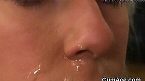 Kinky Stunner Sucking Cum with Facial Shots