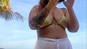 My shorts are marking my big pussy on the beach, flashing exhibitionist style.