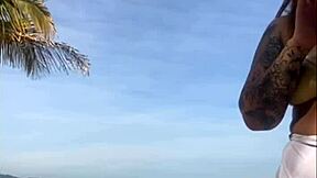 My shorts are marking my big pussy on the beach, flashing exhibitionist style.