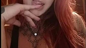 Does The Horny Redhead Tease Fans With Her Pink Tits?