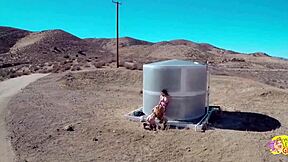 Outdoors, the brunette and blonde lesbians EAT PUSSY and TRIB