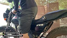 man attaches rocketman toy to motorbike and shakes from orgasm sponsored by store