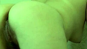 Brunette masturbates hairy anal with big dildo on bed