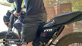 man attaches rocketman toy to motorbike and shakes from orgasm sponsored by store