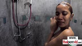 Inked petite thai teen loses her cherry to a massive white cock in the shower