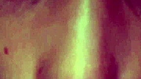 Elzakom teases her sweet pussy with dildo intensely