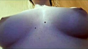 Elzakom teases her sweet pussy with dildo intensely