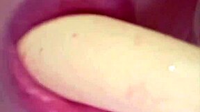 Elzakom teases her sweet pussy with dildo intensely