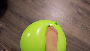 Girl Plays with Balloons in Pantyhose