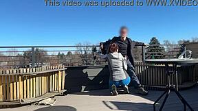 Little redhead slut gives fast handjob and blowjob on the roof.