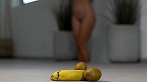 Petite girl crushes fruits under her high heels in hot foot fetish