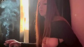 Hot horny milf Artemisia Love showing her big boobs while smoking cigarettes in fetish session!