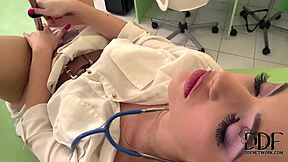 Hot Doctor Sophia Knight Probes Her Pussy With A Speculum