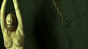 Chained Up Woman Masturbates Her Shaved Pussy