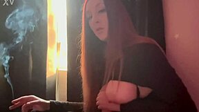 Hot horny milf Artemisia Love showing her big boobs while smoking cigarettes in fetish session!