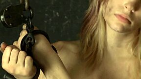 Chained Up Woman Masturbates Her Shaved Pussy