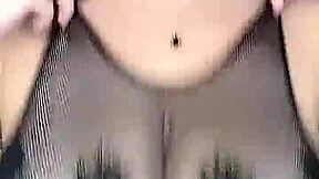 In stockings on the body mesh fucks huge natural tits from above
