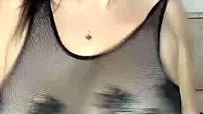 In stockings on the body mesh fucks huge natural tits from above