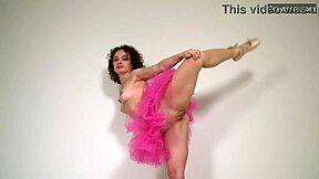 Hot curly-haired gymnast sofa nagy stretches on sofa