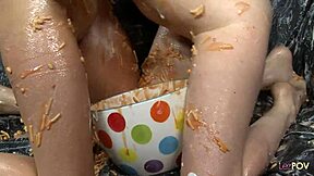 Nasty Lesbians Covered With Food Rub Each Other And Make Out As They Finger Their Cunts