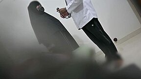 hijab muslim lady examined by doctor in hospital