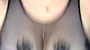 In stockings on the body mesh fucks huge natural tits from above