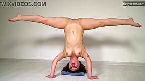 Hot curly-haired gymnast sofa nagy stretches on sofa