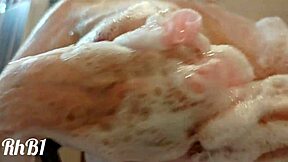 She Offers a Thorough Wash in the Shower